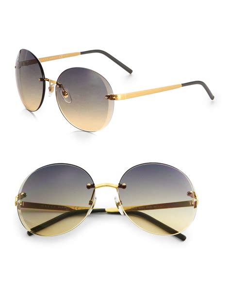 gucci round black and gold sunglasses
